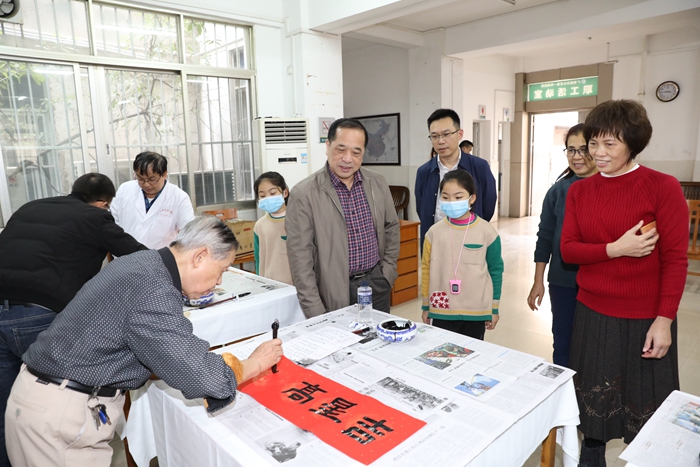 我院举办2022年“耆青工程——写春联送祝福”活动